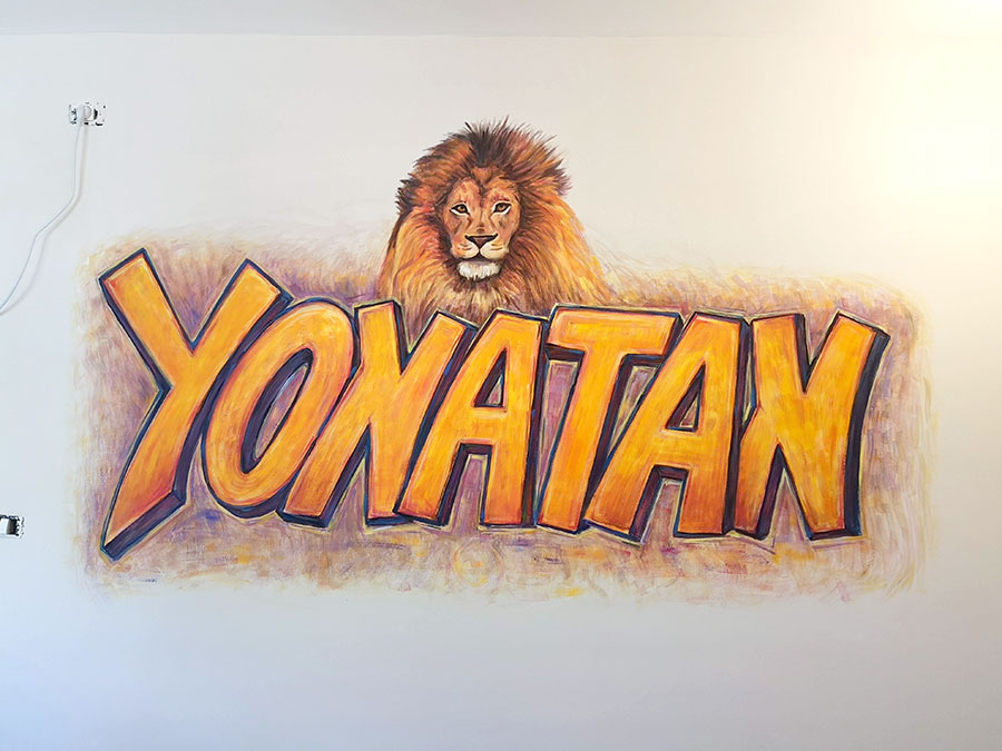 ציור קיר של אריה בחדר של יונתן
